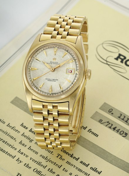 Rolex A FINE 18K YELLOW GOLD AUTOMATIC CENTRE SECONDS WRISTWATCH WITH DATE AND BRACELET REF 6075 CASE 714403 WITH SUPER OYSTER CROWN CIRCA 1950