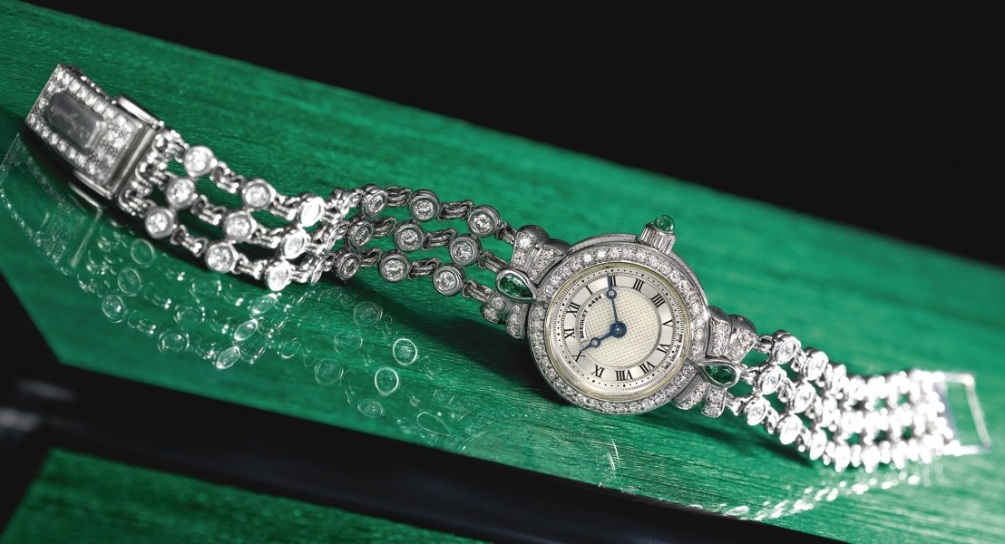 Breguet A LADY'S WHITE GOLD, DIAMOND AND EMERALD-SET BRACELET WATCH CIRCA 2000 REF 8611 NO 4426