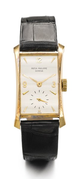 Patek Philippe A FINE 18K YELLOW GOLD FLARED RECTANGULAR WRISTWATCH 1952 REF 2468 MVT 974712 CASE 673472