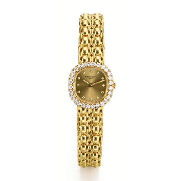 Patek Philippe A LADY'S YELLOW GOLD AND DIAMOND-SET BRACELET WATCH MADE IN 1986 REF 4772/2 MVT 1602024 CASE 2833854