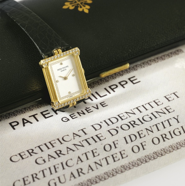 Patek Philippe A LADY'S 18K YELLOW GOLD AND DIAMOND-SET RECTANGULAR WRISTWATCH REF 4632 MVT 1408393 CASE 2806869 'GREEK' MADE IN 1983