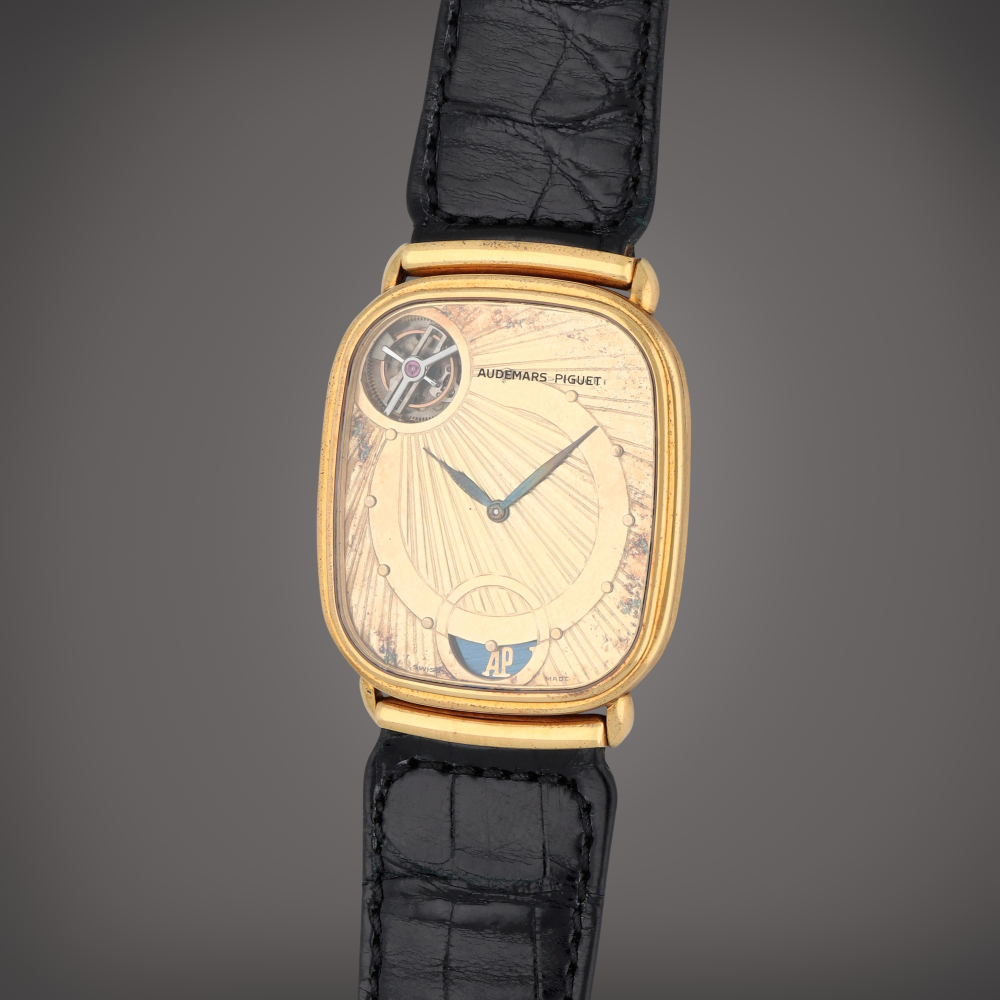 THE HIDDEN COLLECTION

Audemars Piguet

Tourbillon Automatique 'N°7', Reference 25643BA.O.D002CR.01 | A yellow gold cushion shaped tourbillon wristwatch | Circa 1986