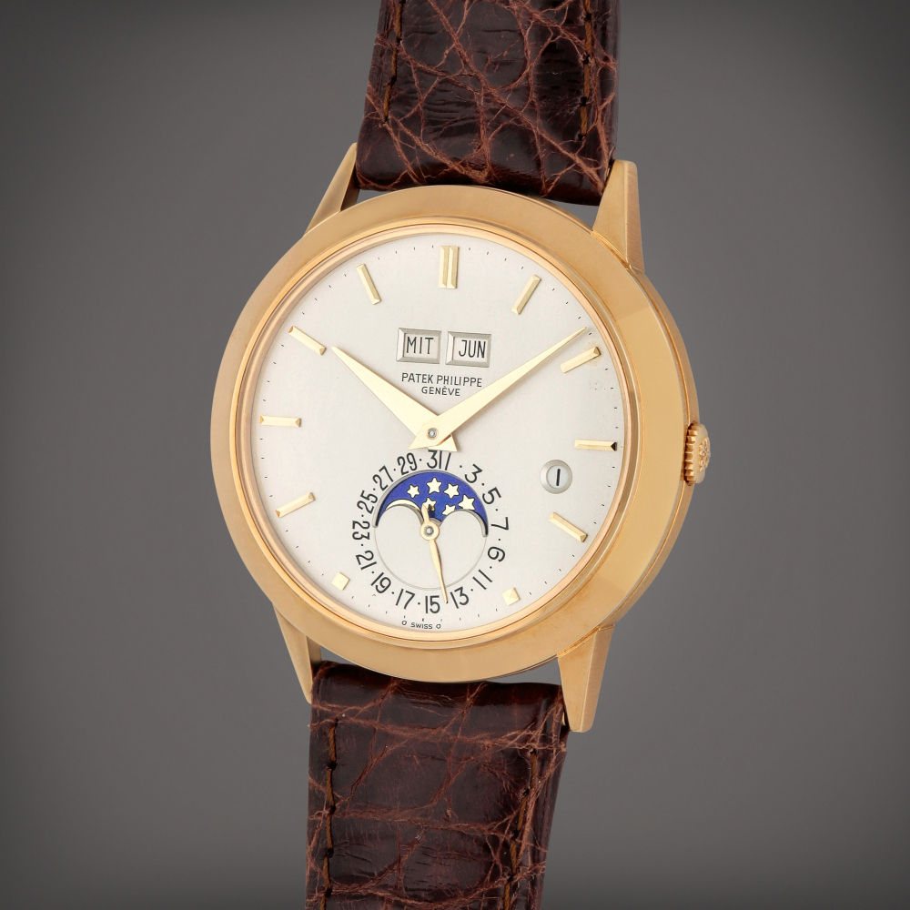 Patek Philippe

'Padellone', Reference 3450 | A yellow gold perpetual calendar wristwatch with moonphases and leap year indication | Made in 1985
