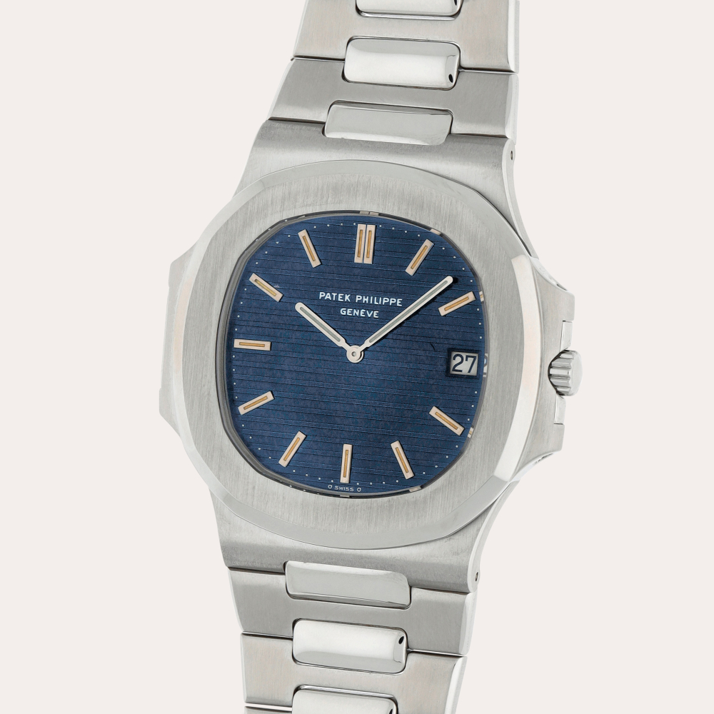 Patek Philippe Nautilus 'Jumbo', Reference 3700/1A | A stainless steel wristwatch with date, bracelet and cork presentation case | Circa 1978
