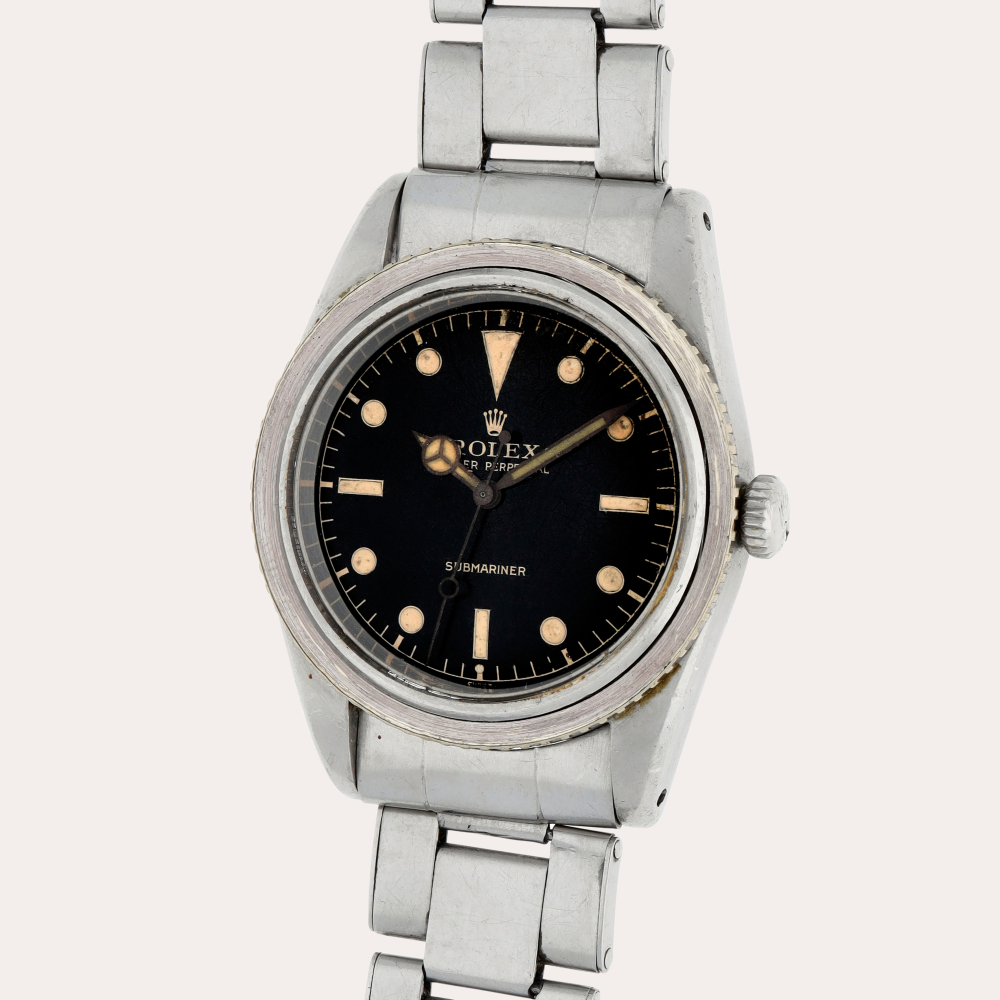 Rolex Submariner, Reference 6205 | A stainless steel wristwatch with bracelet | Circa 1954