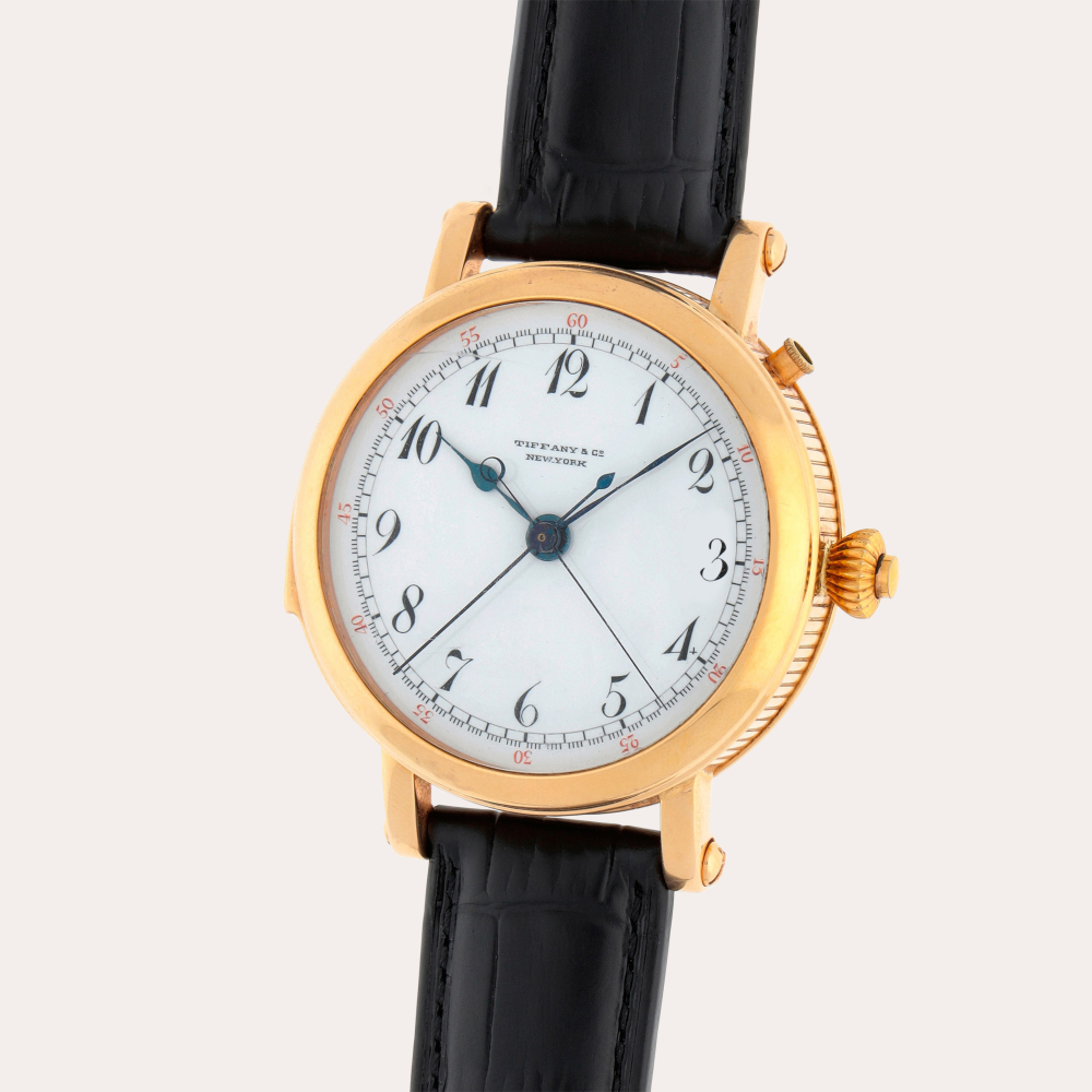 Tiffany Co. A yellow gold minute repeating split-second chronograph wristwatch | Circa 1920