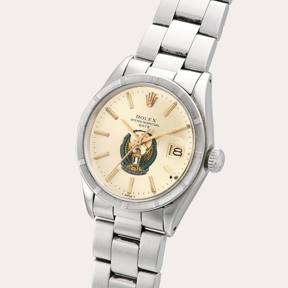 Rolex Oyster Perpetual Date, Reference 1501 | A stainless steel wristwatch with UAE Coat of Arms dial, date and bracelet | Circa 1972