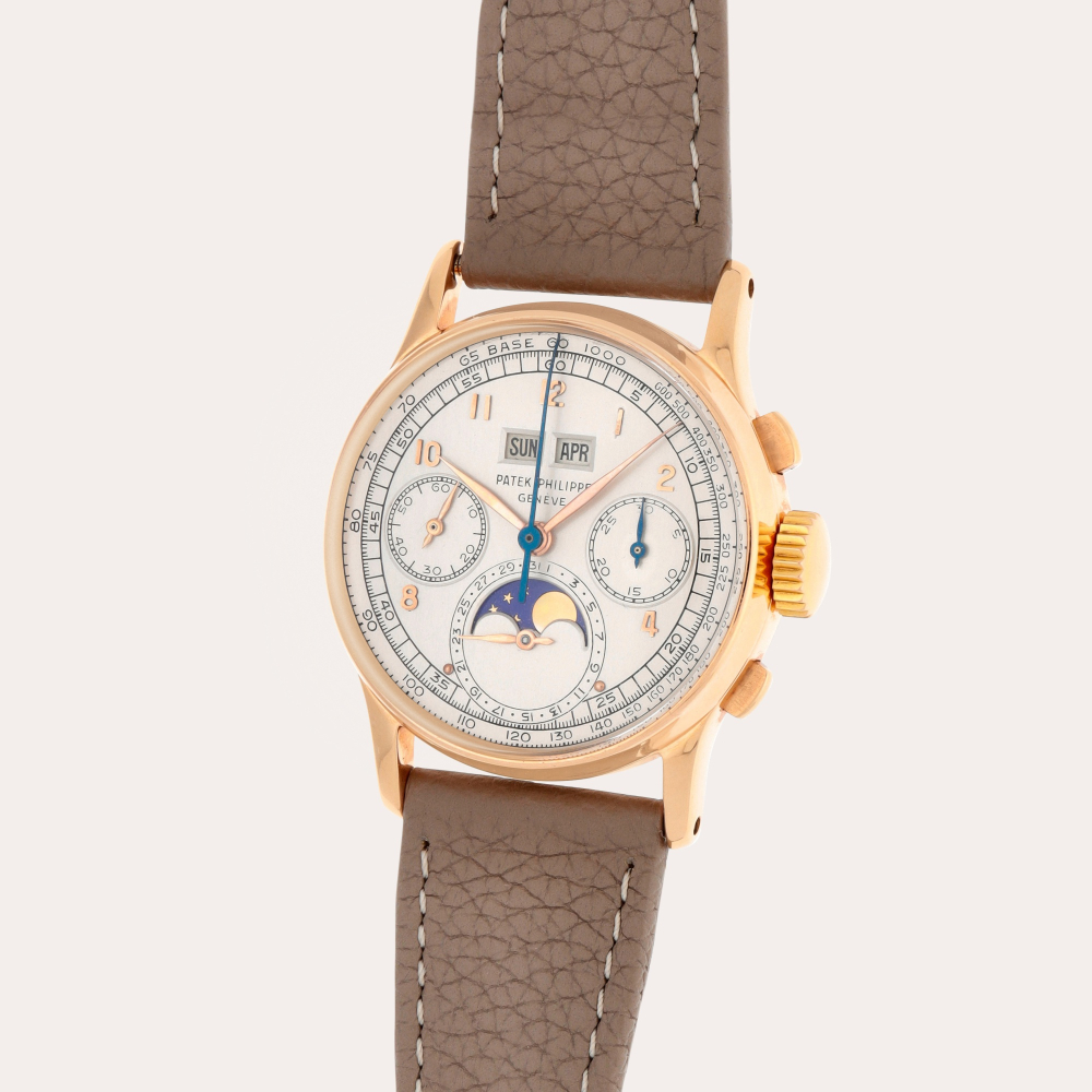 Patek Philippe Reference 1518 | A pink gold perpetual calendar chronograph wristwatch with moon phases | Made in 1948