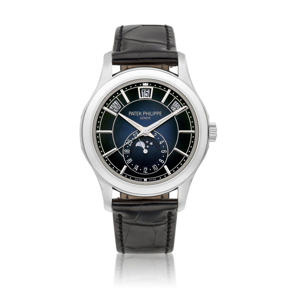 Reference 5205  A white gold annual calendar wristwatch with day date moon phases and 24 hours indication Circa 2019    5205  242019