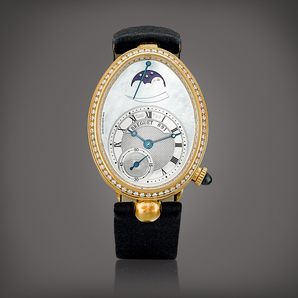 Reine de Naples Reference 8908  A yellow gold and diamondset wristwatch with moon phases power reserve indication and motherofpearl dial Circa 2008    Reine de Naples 8908  2008
