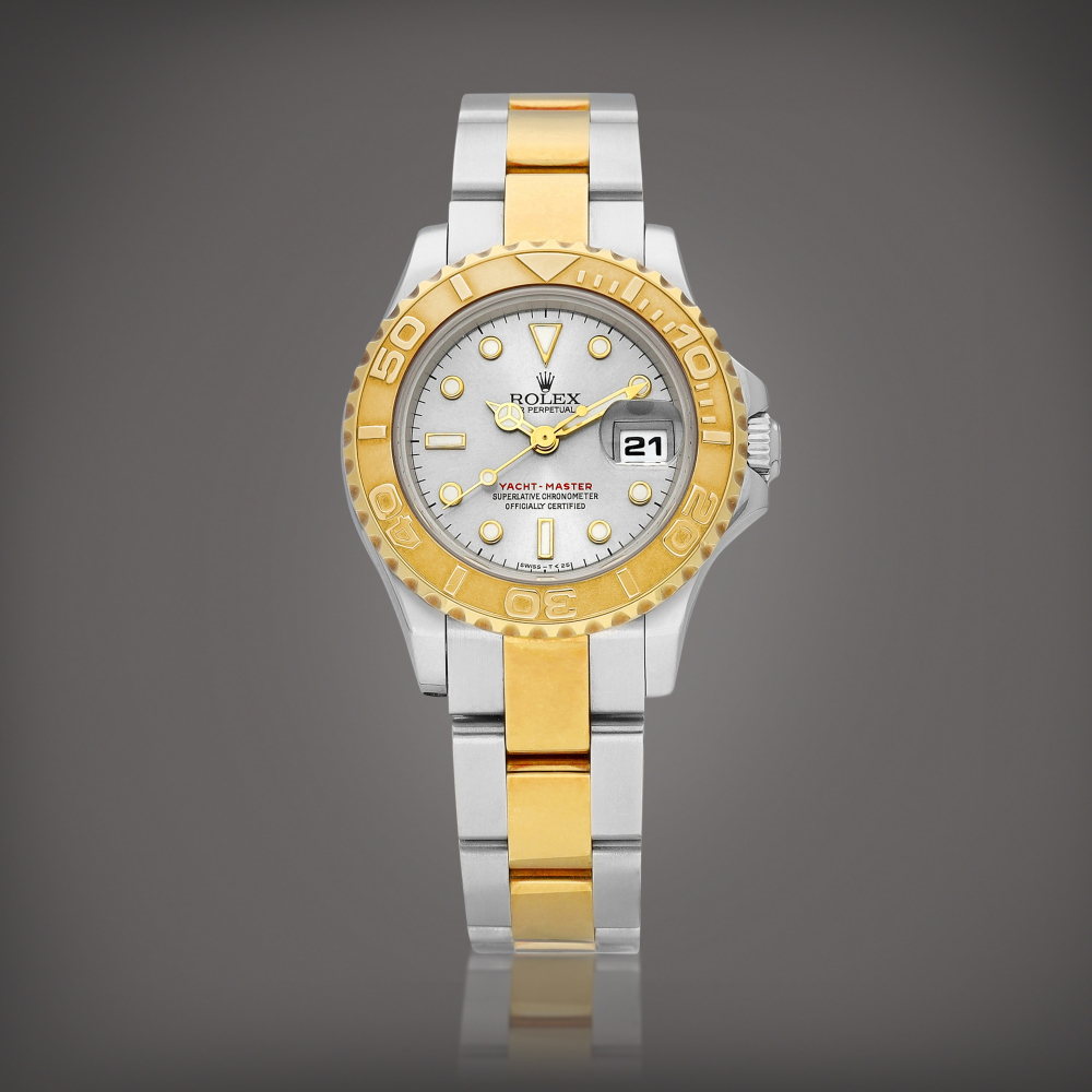 YachtMaster Reference 69623  A yellow gold and stainless steel wristwatch with date and bracelet Circa 1997    YachtMaster 69623  1997