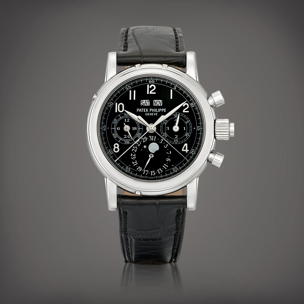 Reference 5004  A platinum perpetual calendar split seconds chronograph wristwatch with moon phases 24 hours and leap year indication Circa 2005    5004  242005