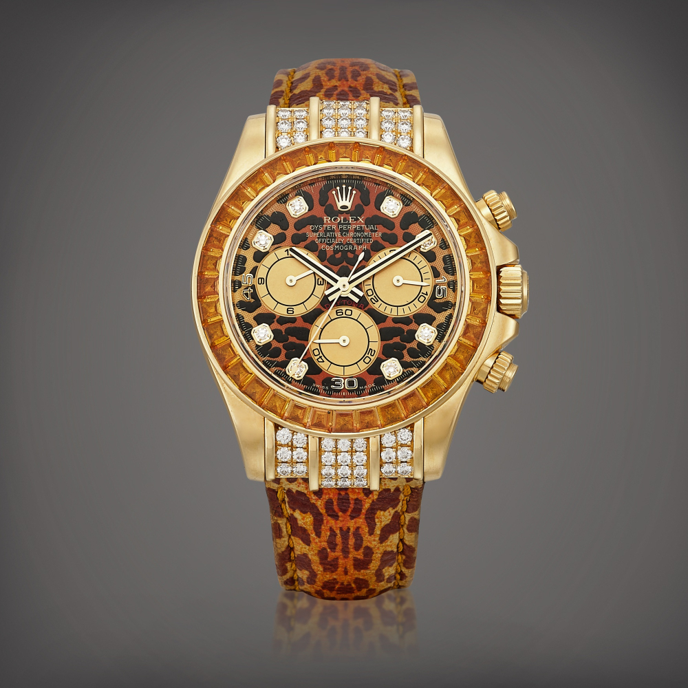 Cosmograph Daytona Leopard Reference 116598 SACO  A yellow gold diamond and orange sapphireset chronograph wristwatch with leopard motif dial Circa 2006    COSMOGRAPH DAYTONA LEOPARD 116598 SACO  2006