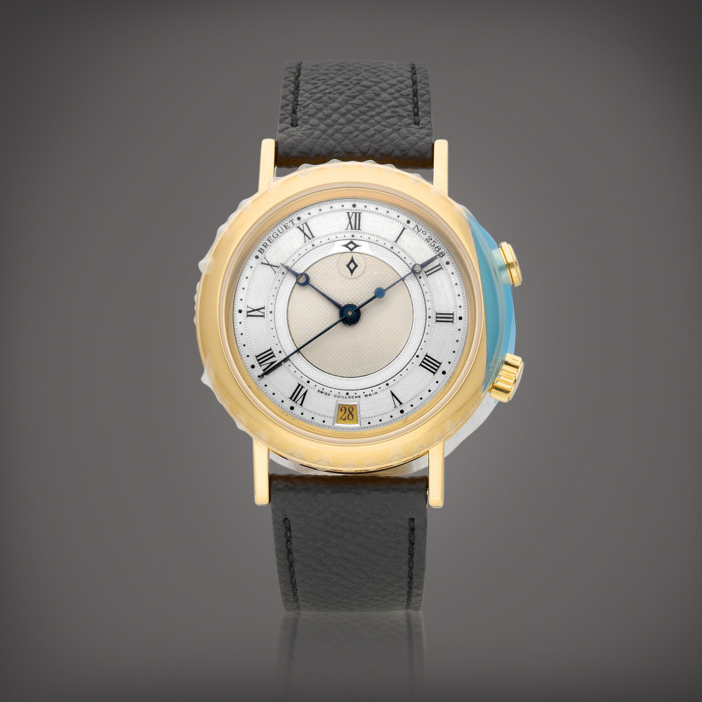 Classique Reference 3600  A yellow gold wristwatch with date and alarm Circa 2000    Classique 3600  2000
