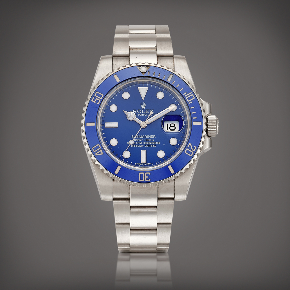 PROPERTY FROM A NOTABLE COLLECTOR  Rolex  Submariner "Smurf", Reference 116619 A white gold wristwatch with date and bracelet, Circa 2011 