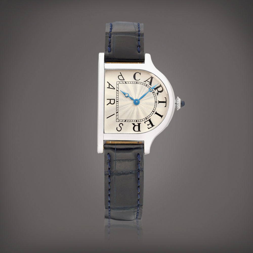 PROPERTY FROM AN IMPORTANT ASIAN COLLECTOR  Cartier  Paris "Cloche", No. 1/1 A unique platinum wristwatch, Made for the thematic auction 'The Magical Art of Cartier', Circa 1996 