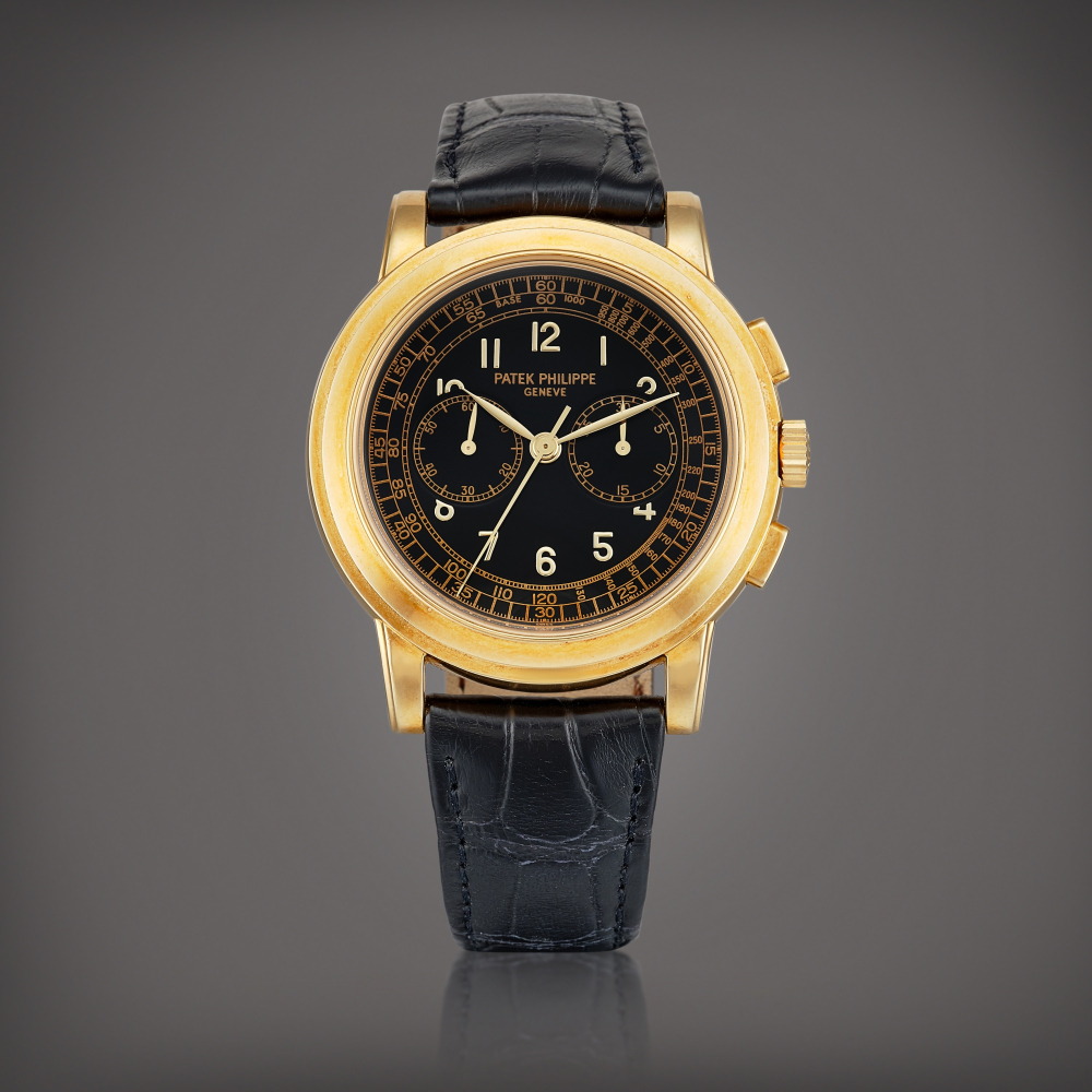 PROPERTY FROM A PROMINENT COLLECTOR  Patek Philippe  Reference 5070 A yellow gold chronograph wristwatch, Circa 1999 