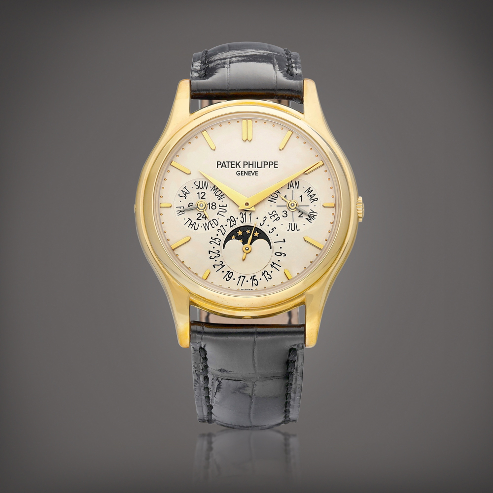 PROPERTY OF A COLLECTOR  Patek Philippe  Reference 5140 A yellow gold perpetual calendar wristwatch with moon phases, 24 hours and leap year indication, Circa 2008 