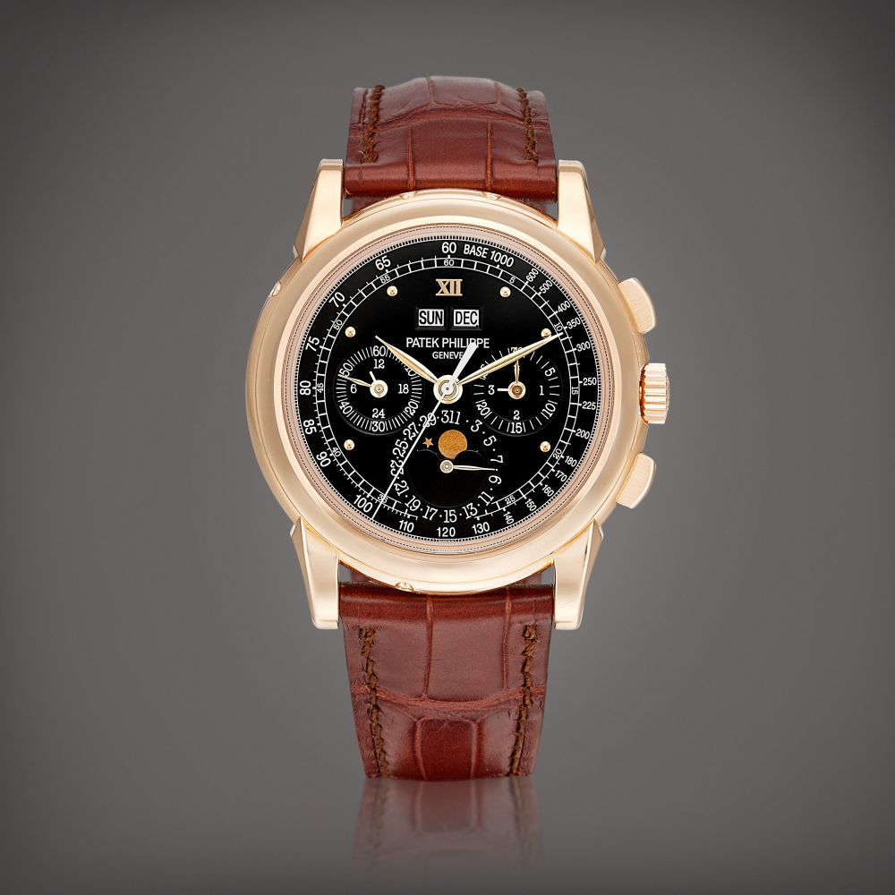 Patek Philippe  Reference 5970 R-018 A pink gold perpetual calendar chronograph wristwatch with moon phases, 24 hours, leap year indication and unusual black tachymeter dial, Circa 2011 