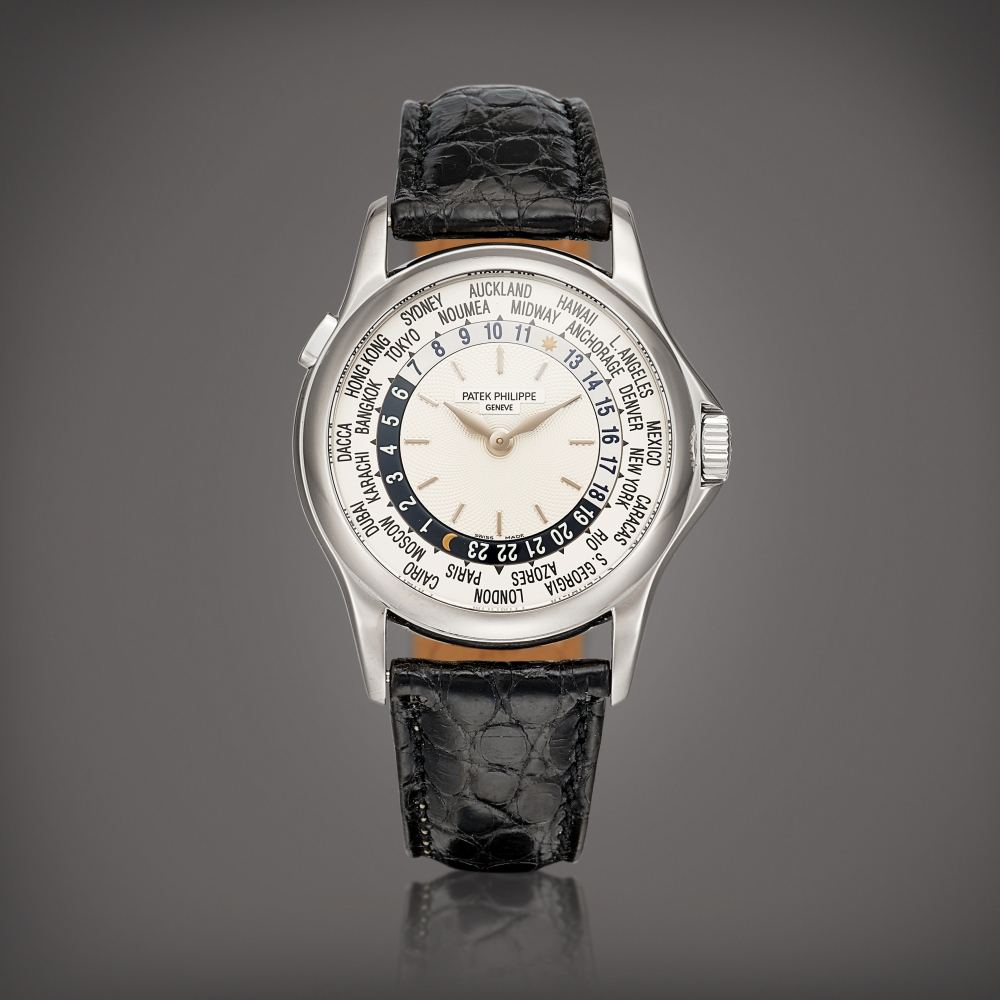 PROPERTY FROM A NOTABLE COLLECTOR  Patek Philippe  Reference 5110 A white gold world time wristwatch, Circa 2003 
