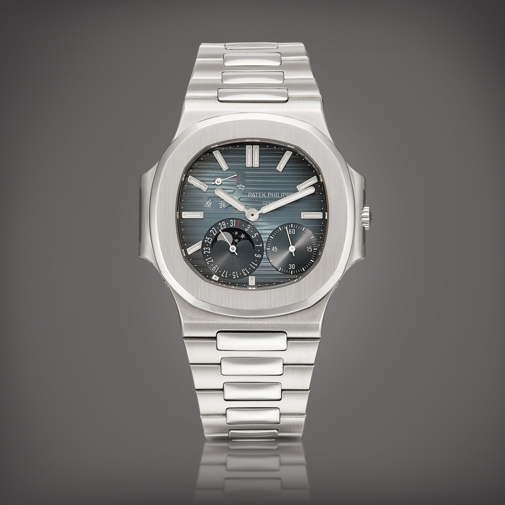 Patek Philippe  Nautilus 'Four Dots', Reference 3712 A stainless steel bracelet watch with date, moon phases and power reserve indication, Circa 2006 