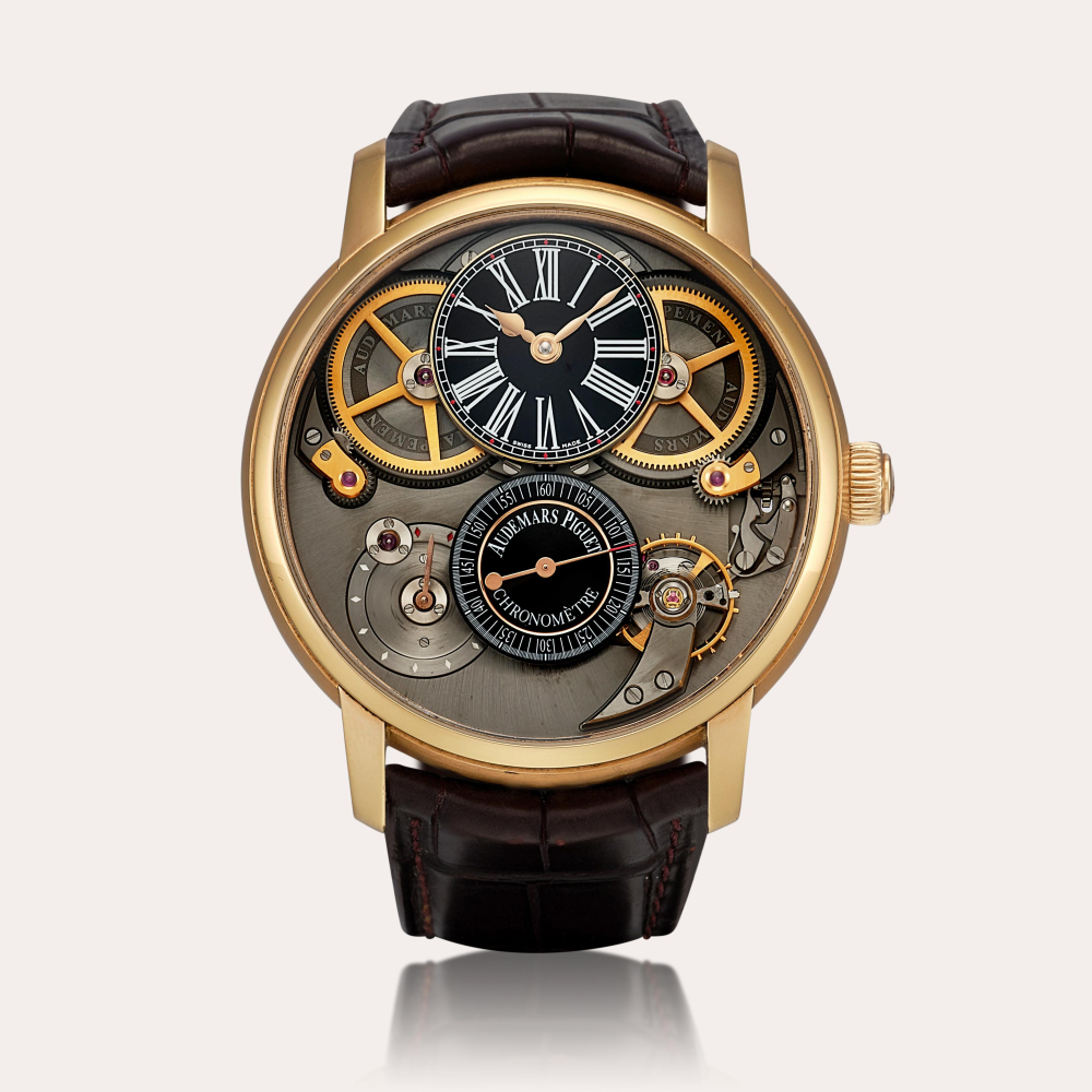 Audemars Piguet Jules Audemars, Reference 26153 | A pink gold semi-skeletonised wristwatch with power reserve indication and black enamel dial, Circa 2016 | 愛彼 | Jules Audemars 型號26153 | 粉紅金半鏤空腕錶，備動力儲備顯示及黑色琺