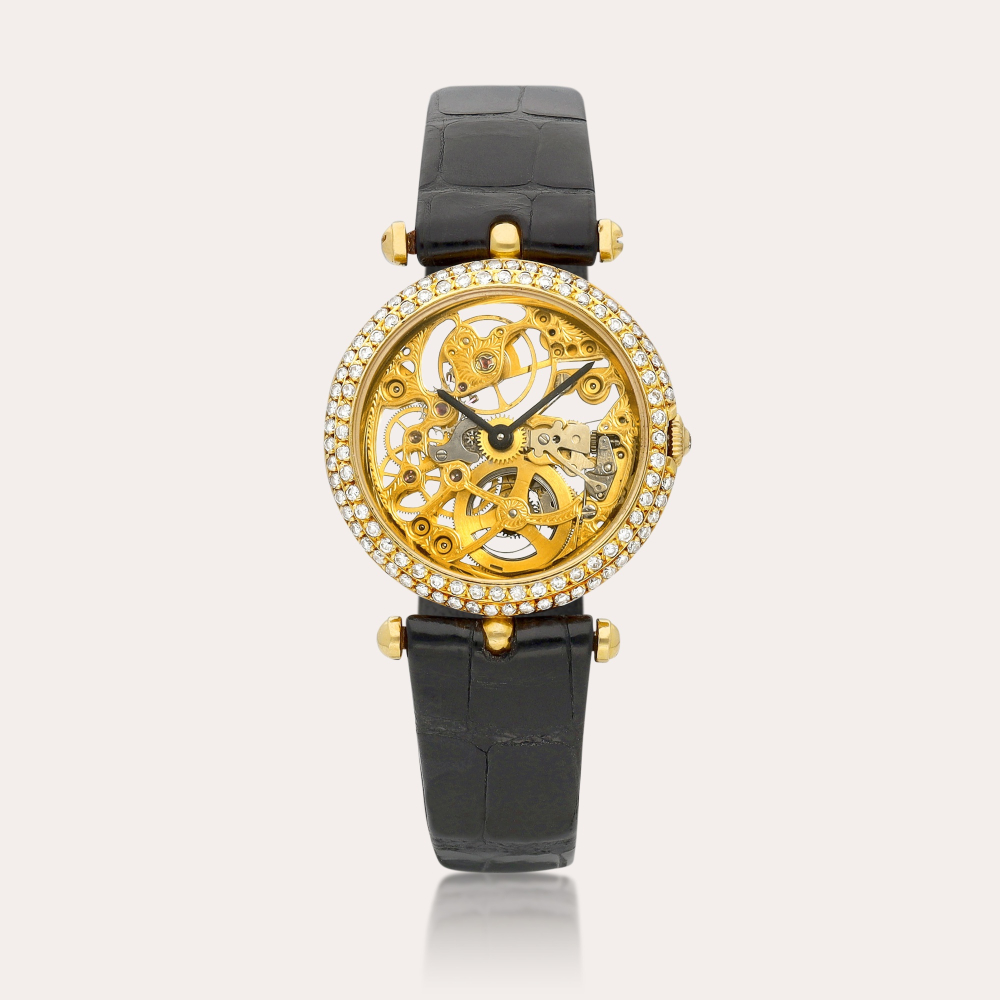 Van Cleef Arpels A yellow gold and diamond-set skeletonised wristwatch, Circa 1980 | 梵克雅寶 | 黃金鑲鑽石鏤空腕錶，約1980年製