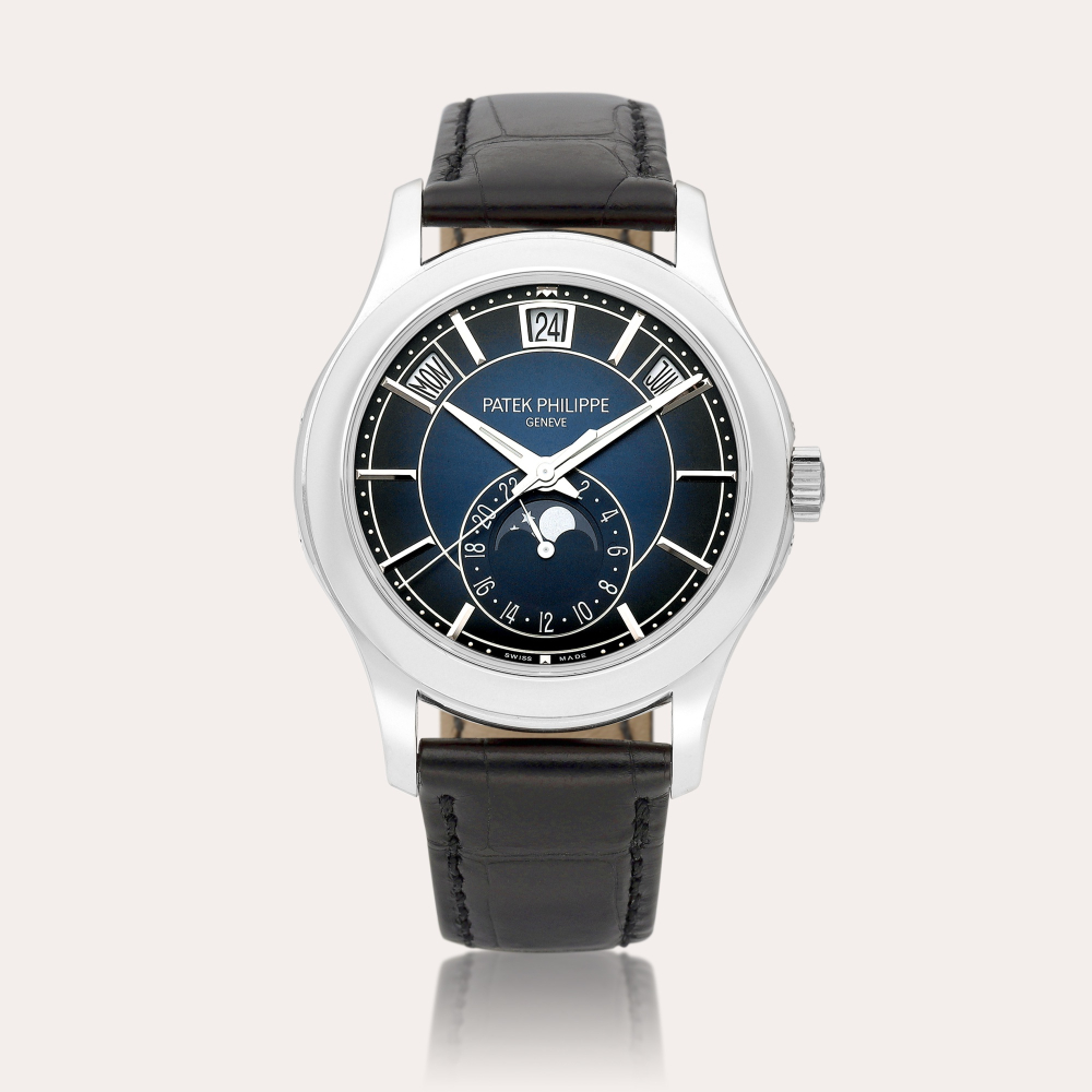 Patek Philippe Reference 5205 | A white gold annual calendar wristwatch with moon phases and 24 hour indication, Circa 2022 | 百達翡麗 | 型號5205 | 白金年曆腕錶，備月相及24小時顯示，約2022年製