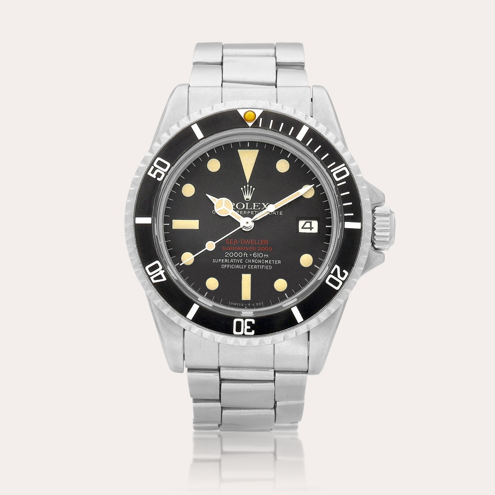 Rolex Submariner 'Double Red Sea-Dweller', Reference 1665 | A stainless steel wristwatch with date and bracelet, Circa 1974 | 勞力士 | Submariner 'Double Red Sea-Dweller' 型號1665 | 精鋼鏈帶腕錶，備日期顯示，約1974年製