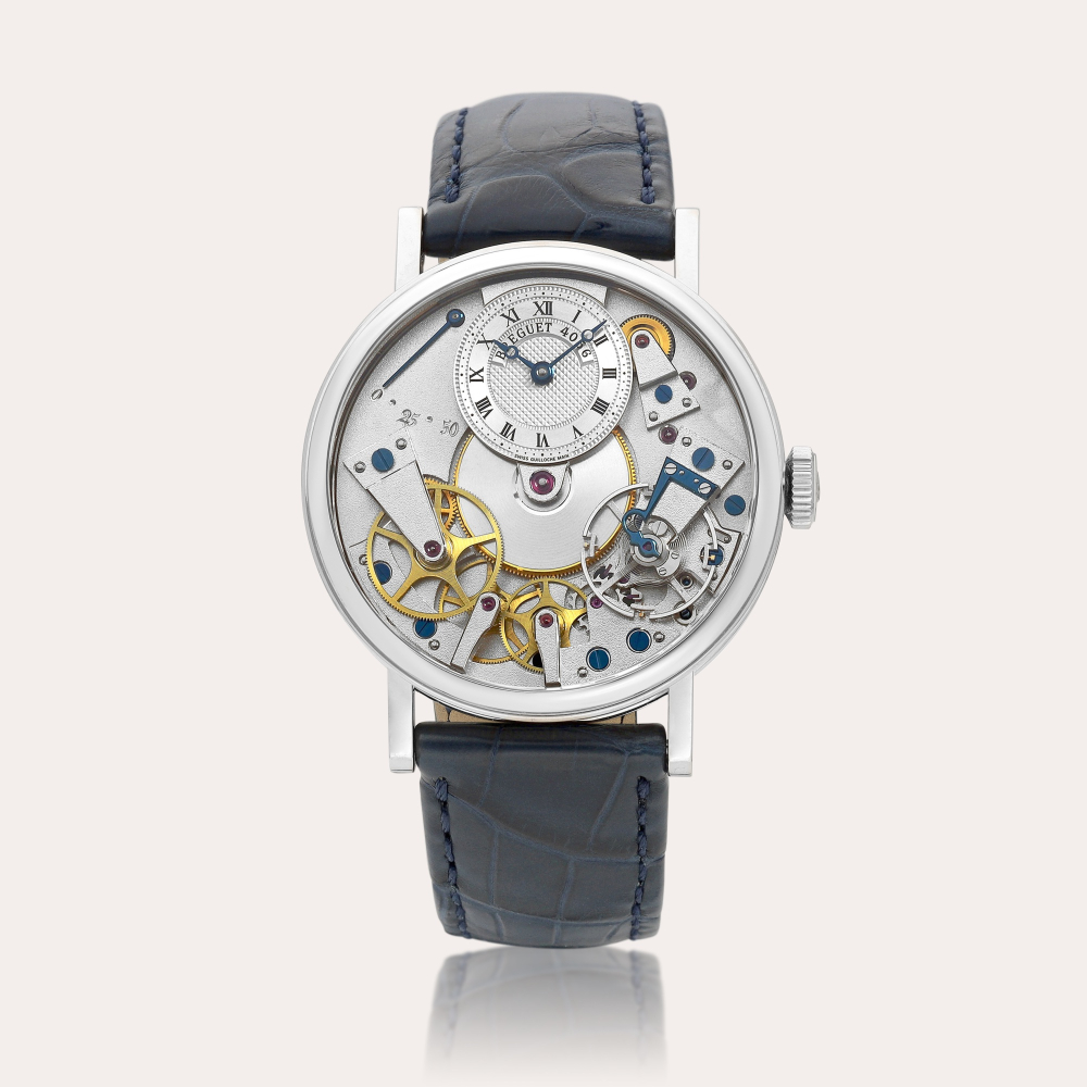 Breguet La Tradition, Reference 7027 | A white gold semi-skeletonised wristwatch with power reserve indication, Circa 2007 | 寶璣 | La Tradition 型號7027 | 白金半鏤空腕錶，備動力儲備顯示，約2007年製
