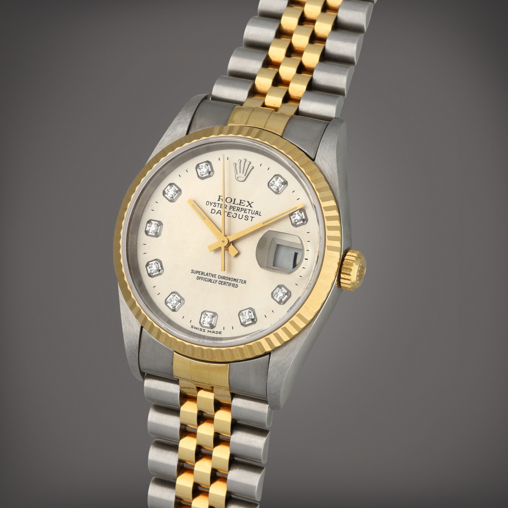 Datejust, Reference 16233 | A stainless steel and yellow gold wristwatch with date, diamond-set indexes and bracelet | Circa 1997