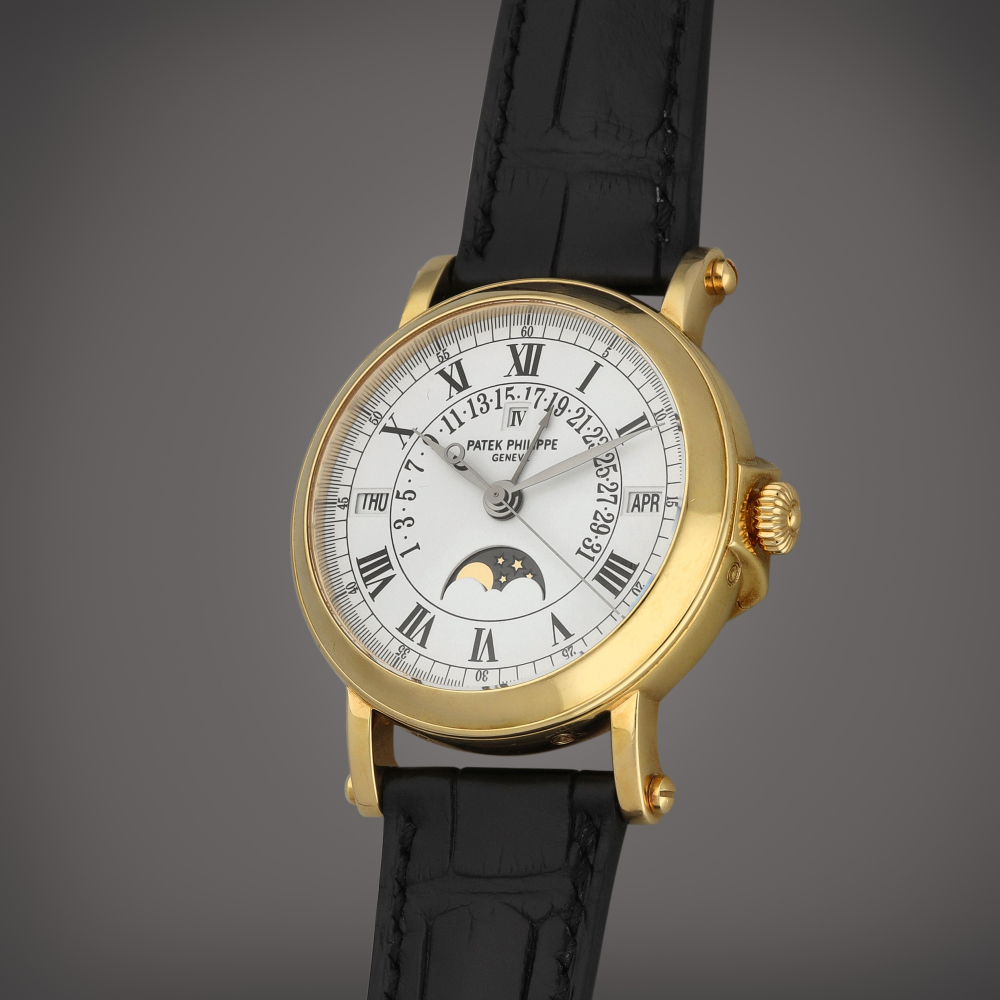 Patek Philippe Reference 5059 | A yellow gold perpetual calendar wristwatch with retrograde date, moon phases and leap-year indication | Circa 1999