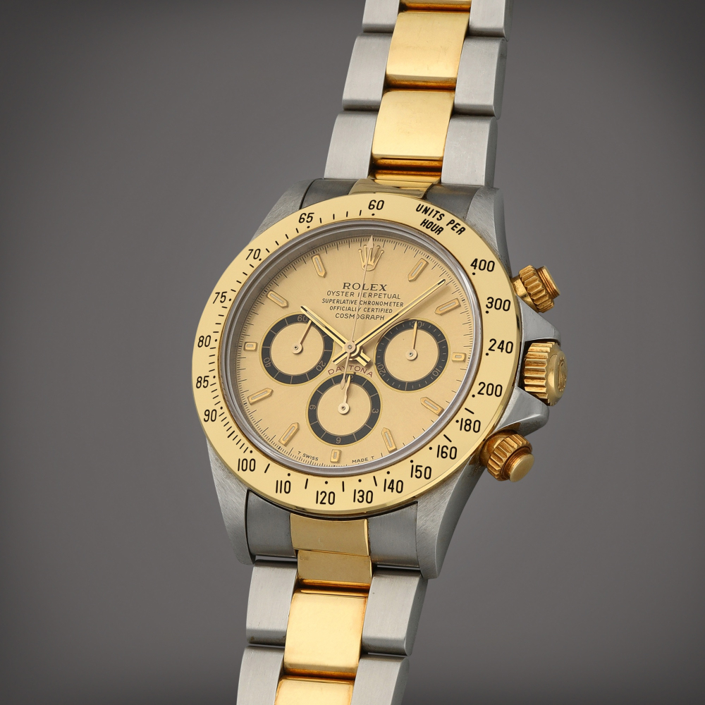 Rolex Daytona ‘Inverted 6 Zenith’, Reference 16523 | A stainless steel and yellow gold chronograph wristwatch with bracelet | Circa 1995