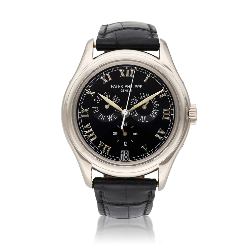 Reference 5035 | A white gold annual calendar wristwatch with date and 24 hours indication, Circa 1998