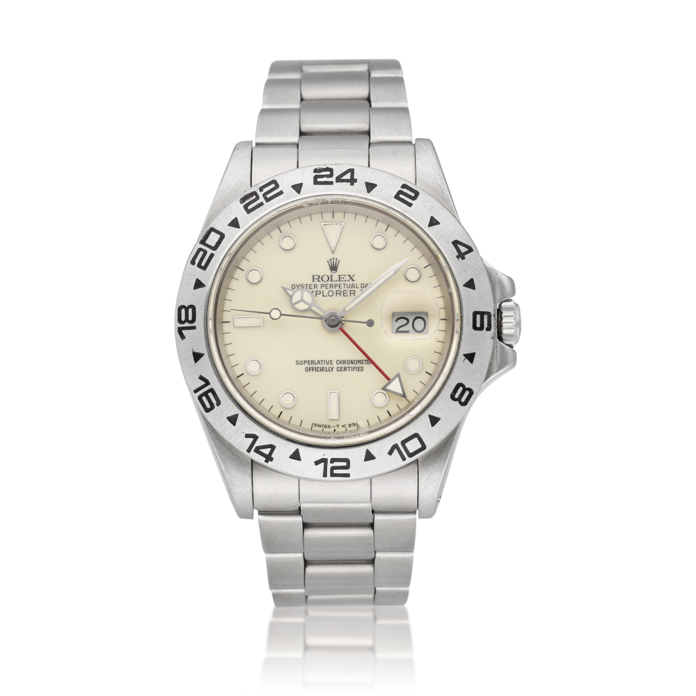 Reference 16550 Explorer II | A stainless steel dual time zone automatic wristwatch with cream dial, date and bracelet, Circa 1986