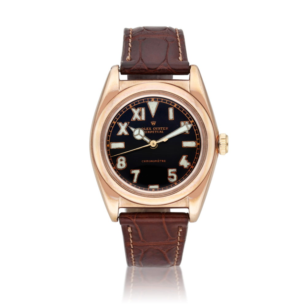 Reference 3696 Oyster Perpetual Bubbleback | A pink gold and stainless steel automatic wristwatch, Circa 1944