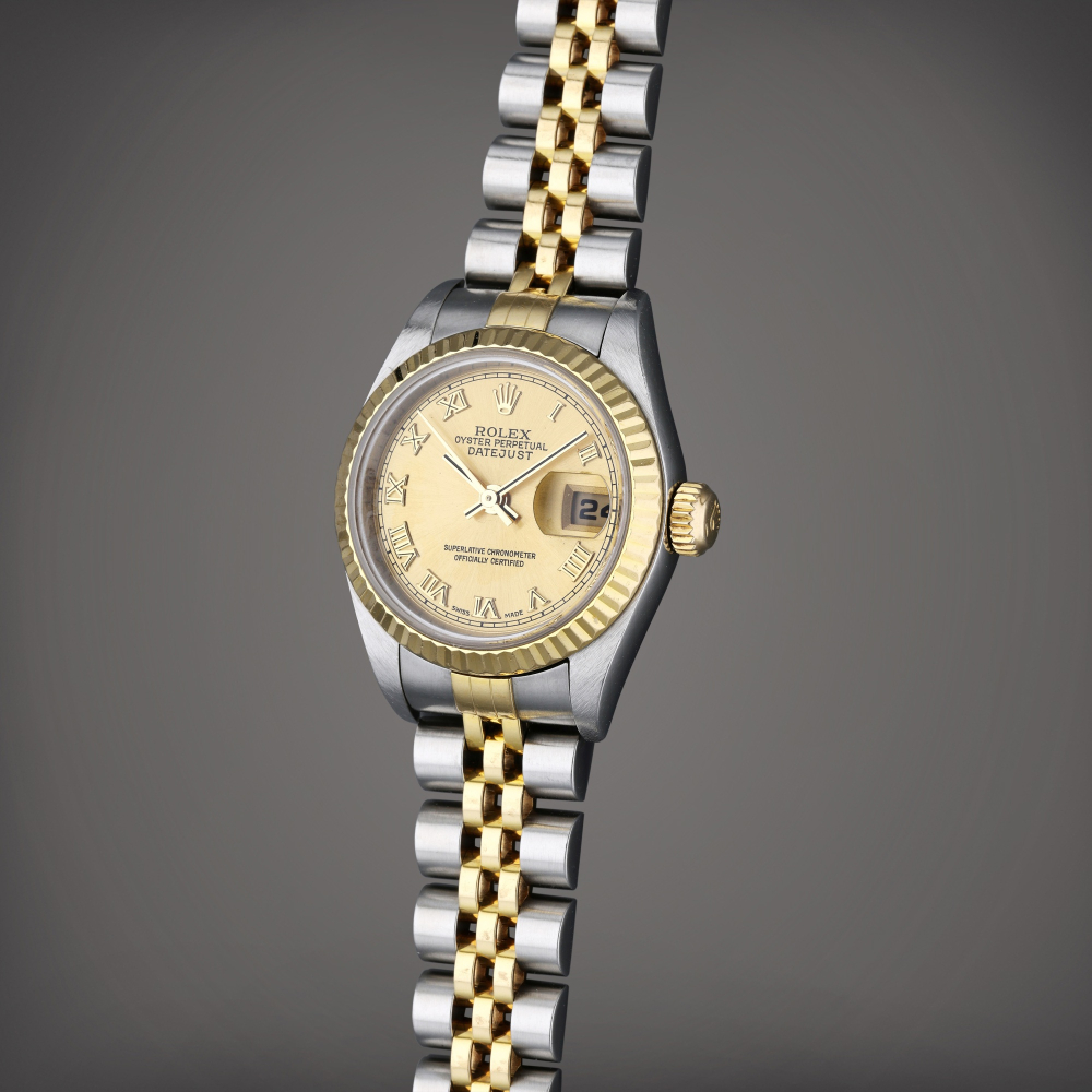 Reference 79173 Datejust | A yellow gold and stainless steel automatic wristwatch with date and bracelet, Circa 2004