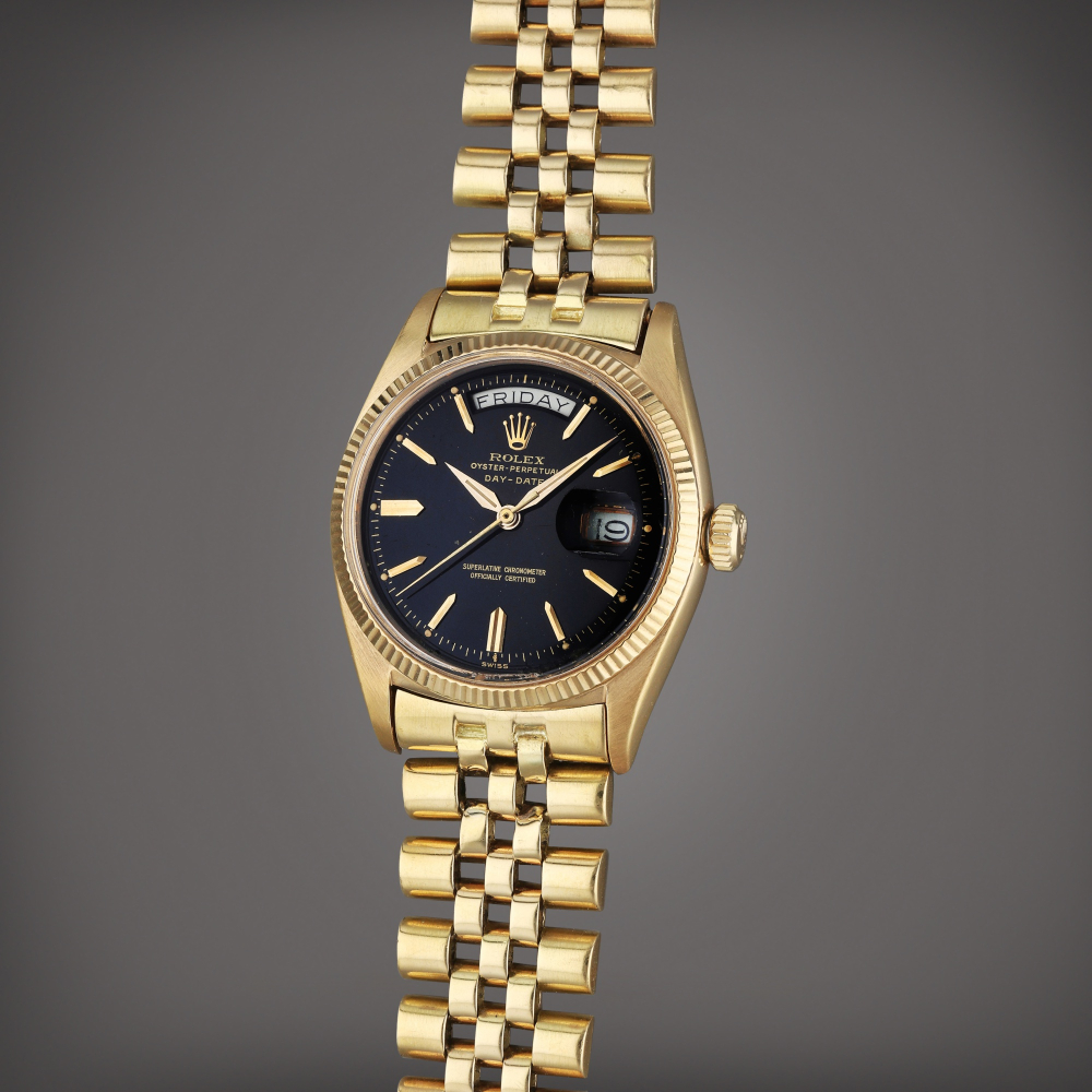 Reference 6611 B Day-Date | A yellow gold automatic wristwatch with day, date and bracelet, Circa 1958