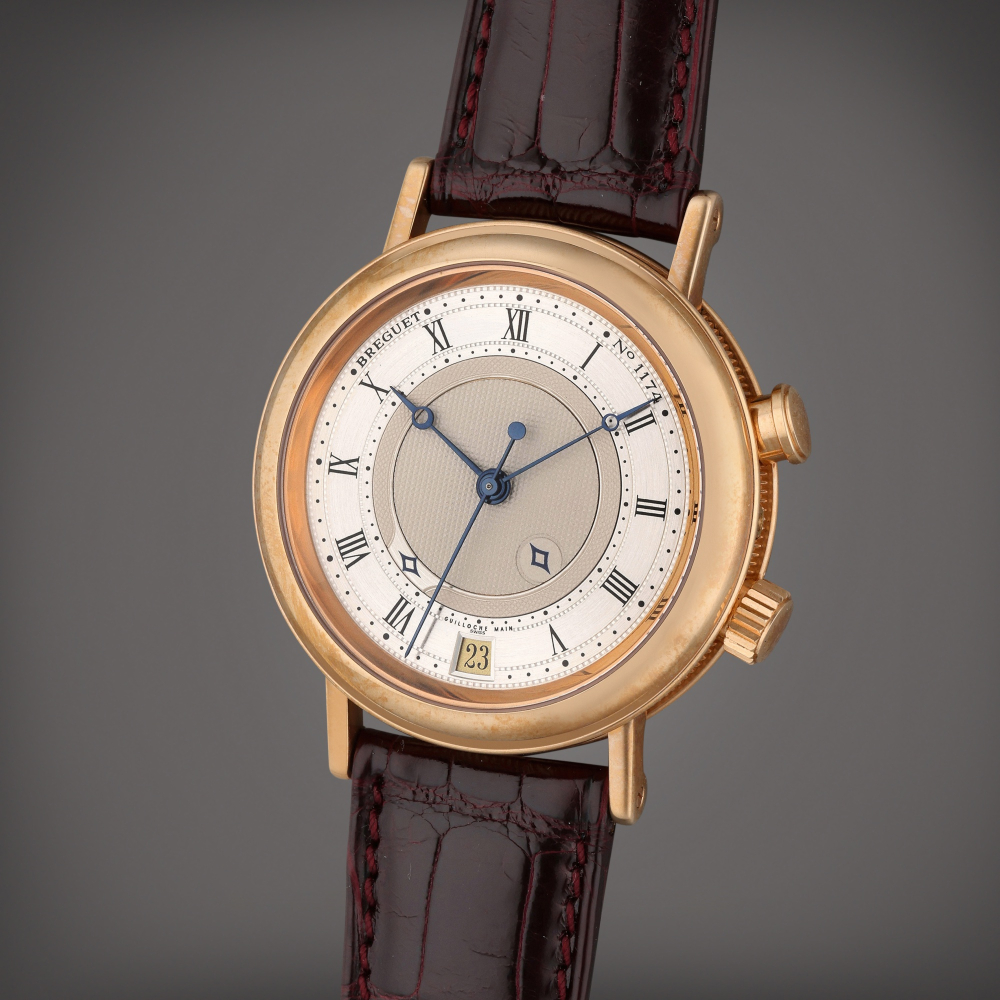 Reference 3600 Classique | A pink gold automatic wristwatch with alarm and date, Circa 2000