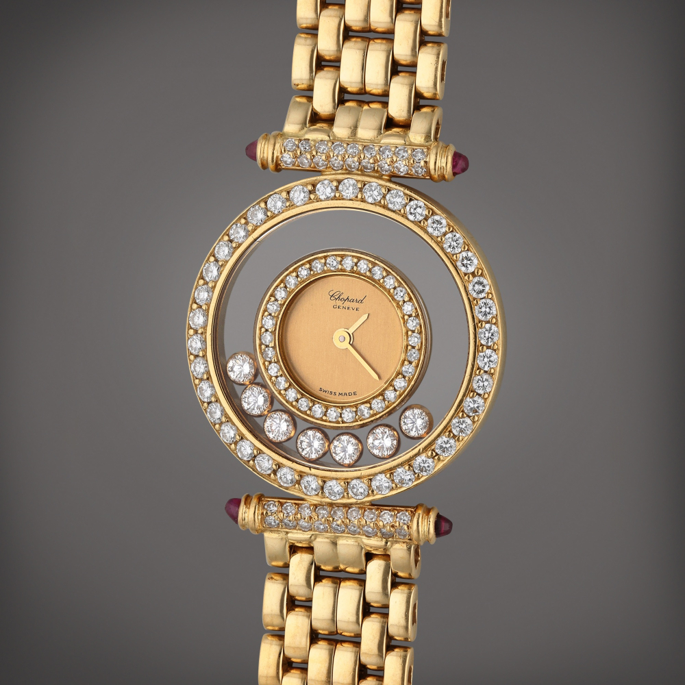 Reference 4118 (204993-0003) Happy Diamonds | A yellow gold and diamond-set bracelet watch with floating diamonds, Circa 1990