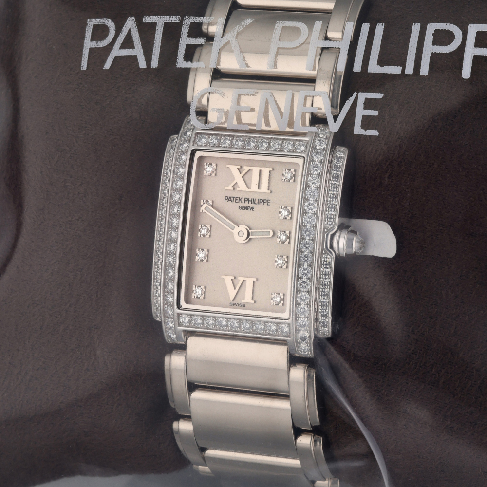 Reference 4908 Twenty-4 | A white gold and diamond-set wristwatch with bracelet, Service Sealed, Circa 2004
