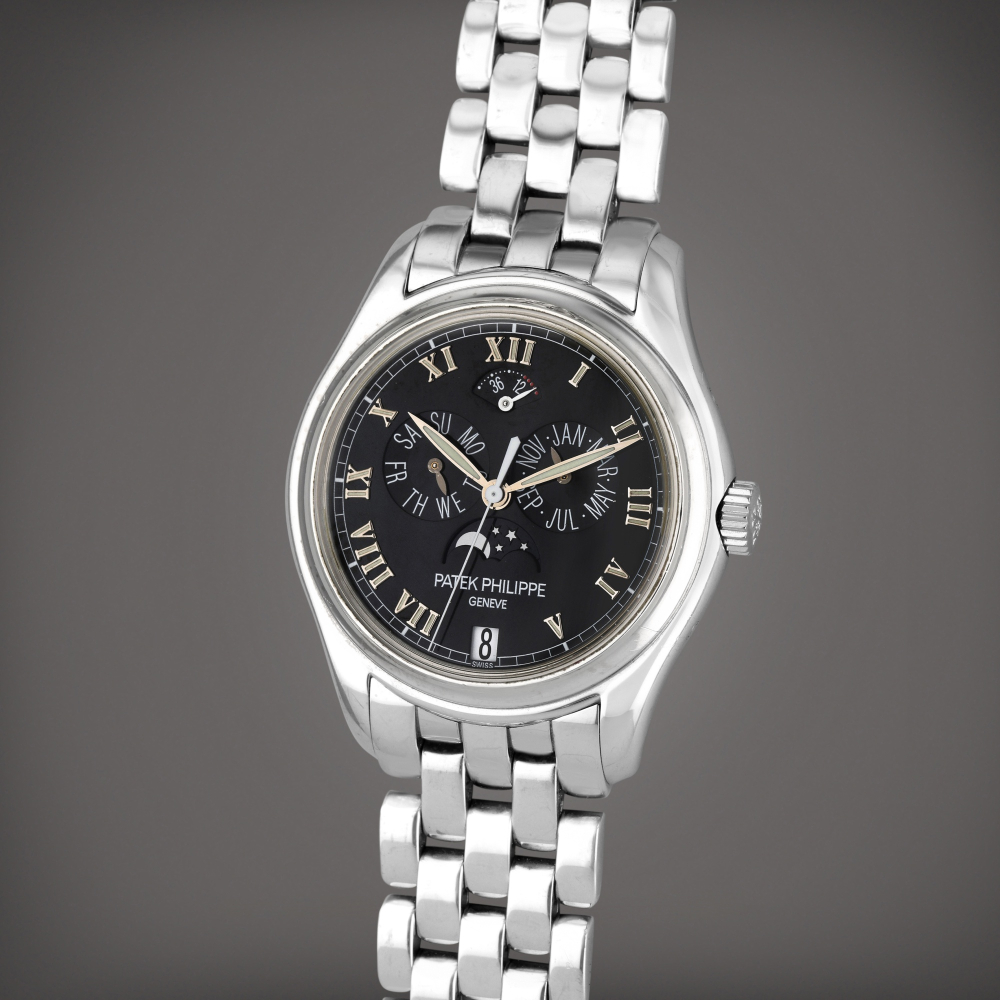 Reference 5036/1G-013 | A white gold automatic annual calendar wristwatch with moon phases and bracelet, Circa 2005