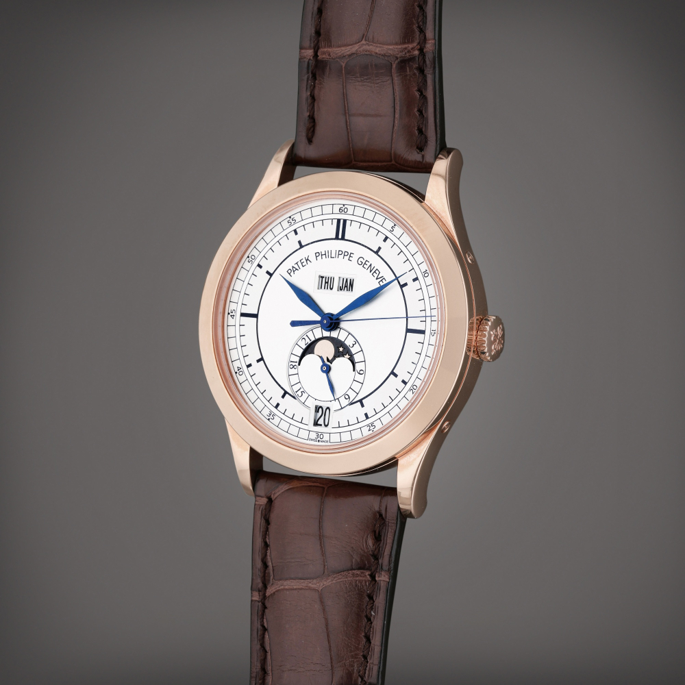 Reference 5396R-001 | A pink gold annual calendar wristwatch with day, date, moon phases and 24 hours indication, Circa 2013