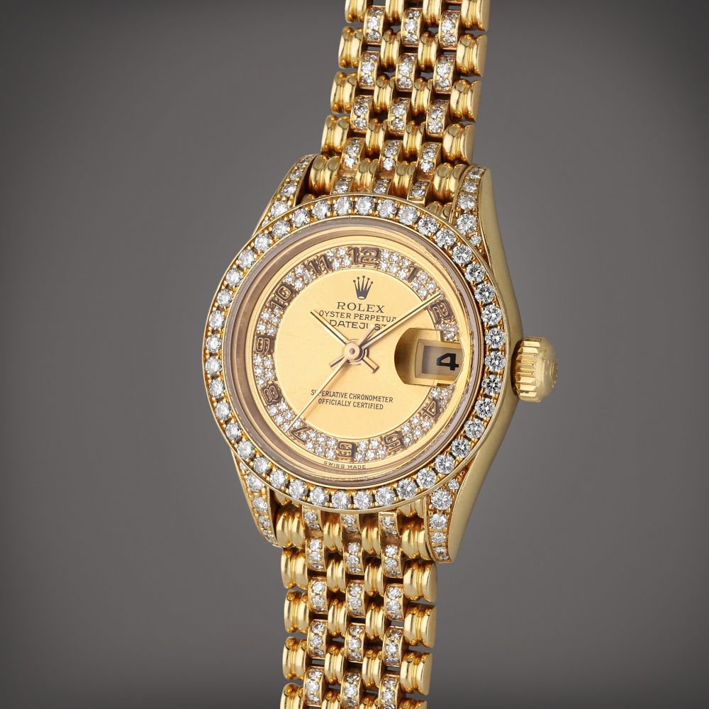 Reference 69158 Lady DateJust | A yellow gold and diamond-set automatic wristwatch with date and bracelet, Circa 1995