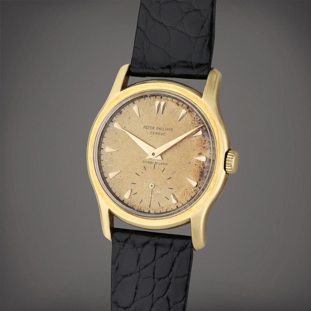 Reference 2450 | Retailed by Gobbi Milano: A yellow gold wristwatch, Made in 1951