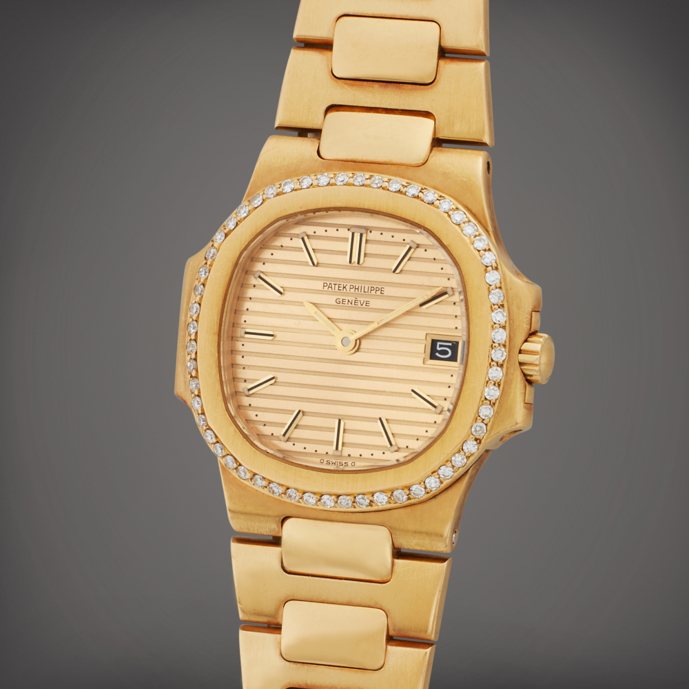 Reference 4700/2 Nautilus | A yellow gold and diamond-set wristwatch with date and bracelet, Circa 1990