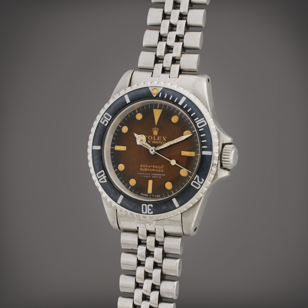 Reference 5512 Submariner | A stainless steel automatic wristwatch with tropical gilt dial and bracelet, Circa 1966