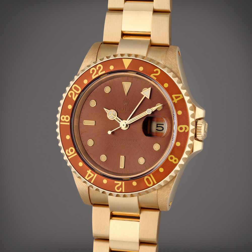 Reference 16718 GMT-Master | A yellow gold automatic dual time wristwatch with date and bracelet, Circa 1991