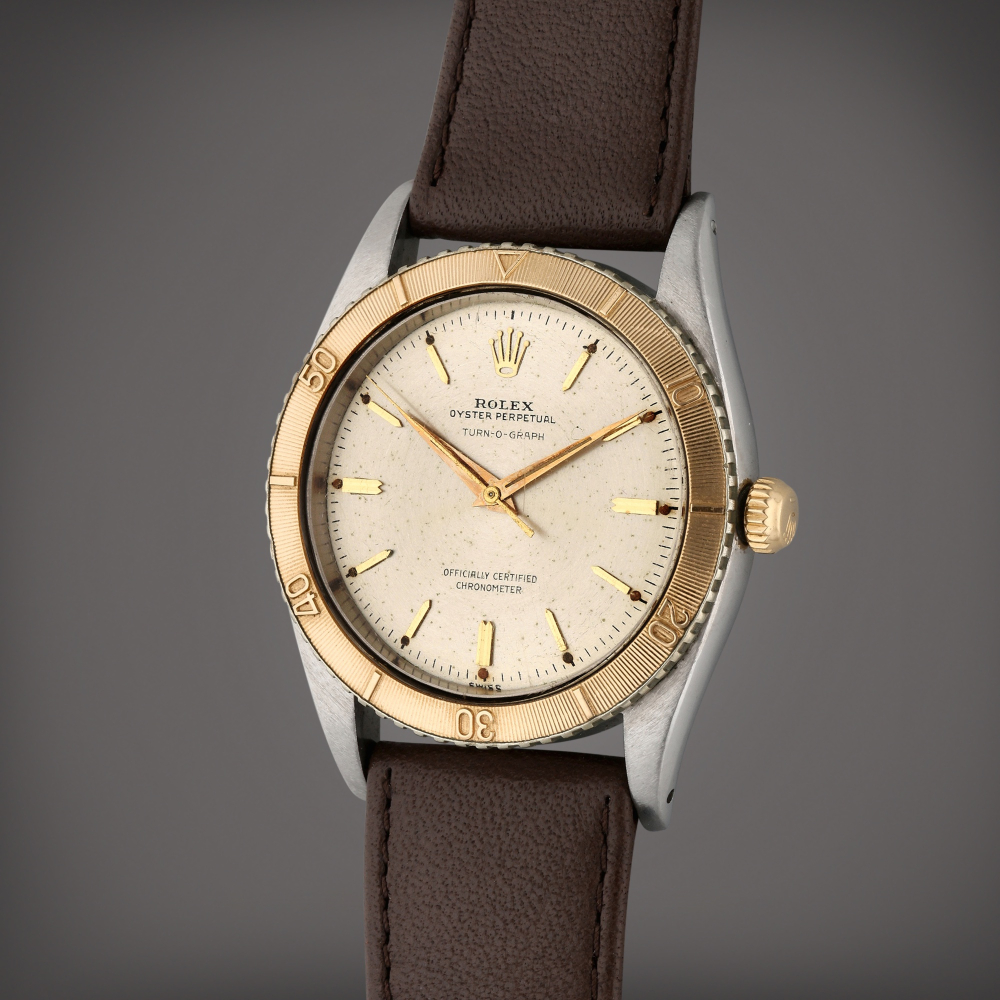 Reference 6202 Turn-o-graph | A yellow gold and stainless steel automatic wristwatch, Circa 1953