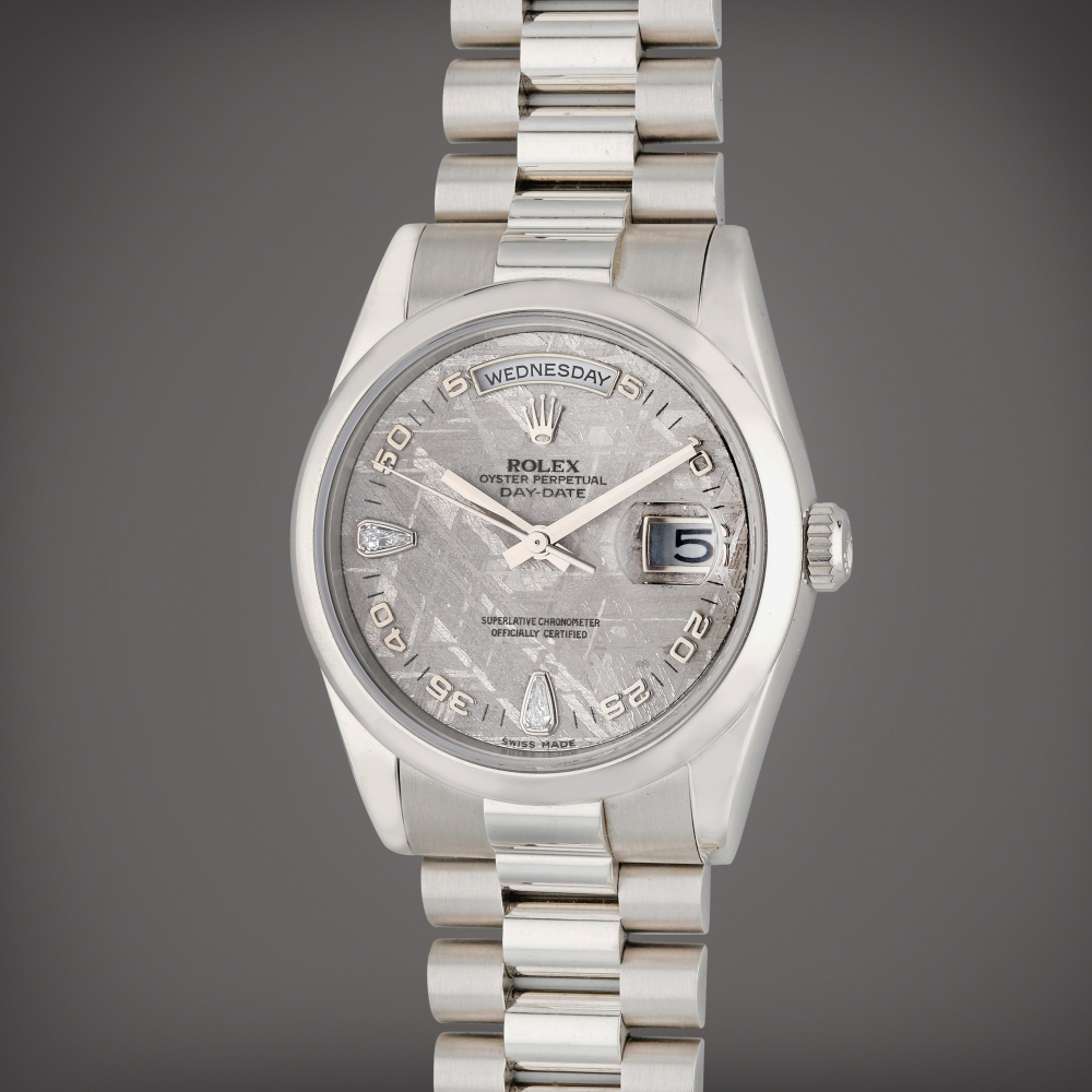 Rolex Reference 118206 Day Date | A platinum and diamond-set automatic wristwatch with day, date, and meteorite dial, Circa 2006